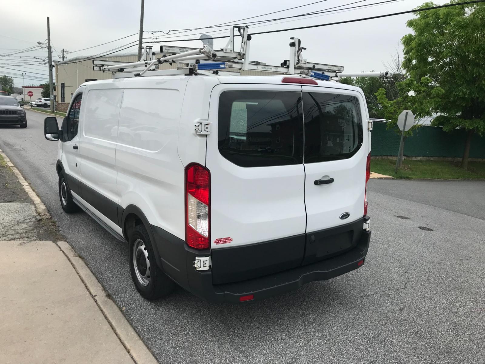 2018 White /Gray Ford Transit 150 (1FTYE1YM1JK) with an 3.7 V6 engine, Automatic transmission, located at 577 Chester Pike, Prospect Park, PA, 19076, (610) 237-1015, 39.886154, -75.302338 - 2018 Ford Transit 150: Dual drop down ladder racks, multiple pieces of shelving, power inverter w/ outlet, heavy duty partition, FLEET MAINTAINED, runs LIKE NEW! This vehicle comes inspected and has been given a bumper to bumper safety check. It is very clean, reliable, and well maintained. We of - Photo #5